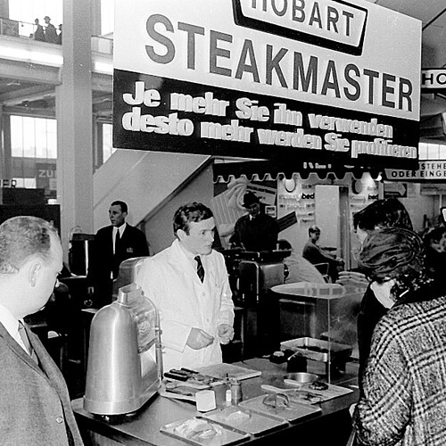 Product demonstration at the Hobart Steakmaster booth in 1967.